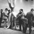 Yuasa (second from right) with the Viras suit on the set of Gamera vs. Viras