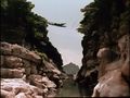 A bridge on Infant Island collapses as Takuya, Masako Tezuka, and Kenji Ando try to cross it