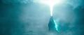Godzilla fires his atomic breath into the sky in front of USS Scorpion