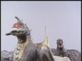 Dororin sneaks behind Gigan disguised as Godzilla