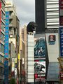 The Godzilla Head with a poster for GODZILLA: Planet of the Monsters