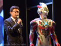 Taguchi with Ultraman X at the 2015 International Tokyo Toy Show