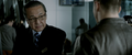 A screenshot of Takarada as a Japanese immigrant agent in a Godzilla (2014) deleted scene