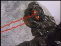 Hedorah fires its rays at Mothra