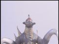 Gigan watches as Rodan and Mothra escape with Godzilla