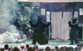 The Minilla suit used in Go! Greenman on stage with the MegaroGoji suit in 1974