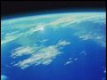 Gigan fires an arrow that heads towards Earth