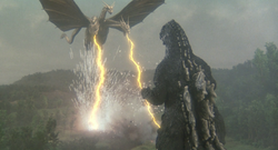 King Ghidorah takes flight and fires his gravity beams at Godzilla (Godzilla vs. King Ghidorah)