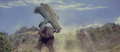 Godzilla throws Gabara over his shoulder