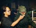 Wakasa with a Godzilla suit from Godzilla 2000: Millennium