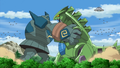 The giant Golurk fighting Mecha Tyranitar