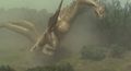 King Ghidorah stomps Godzilla into the ground