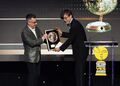 Michael Dougherty presents Takashi Yamazaki a Visionary Award at the 23rd annual VES Awards