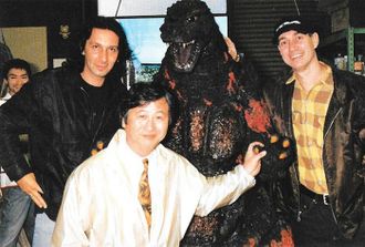 Patrick Tatopoulos (left) with Koichi Kawakita (center) and Roland Emmerich (right)