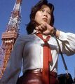 Giruge receives information from Zanon's captain at Tokyo Tower in Gamera Super Monster