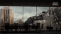 Mechagodzilla slamming Godzilla into buildings