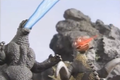 Godzilla and Gigan firing their rays together