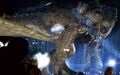 Godzilla bleeds while being fired upon by the United States military