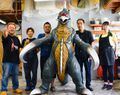 Wakasa with the replica Showa Gigan suit from Fest Godzilla 3: Gigan Attacks