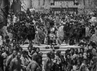 A group of Skull Islanders during a sacrificial ceremony
