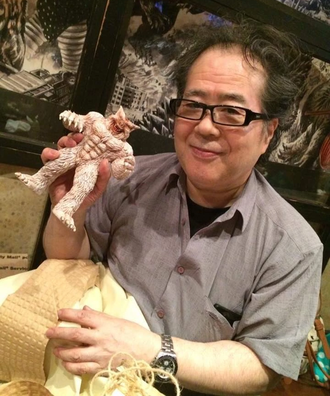 Shizuo Nakajima with a figure of the Wolfman